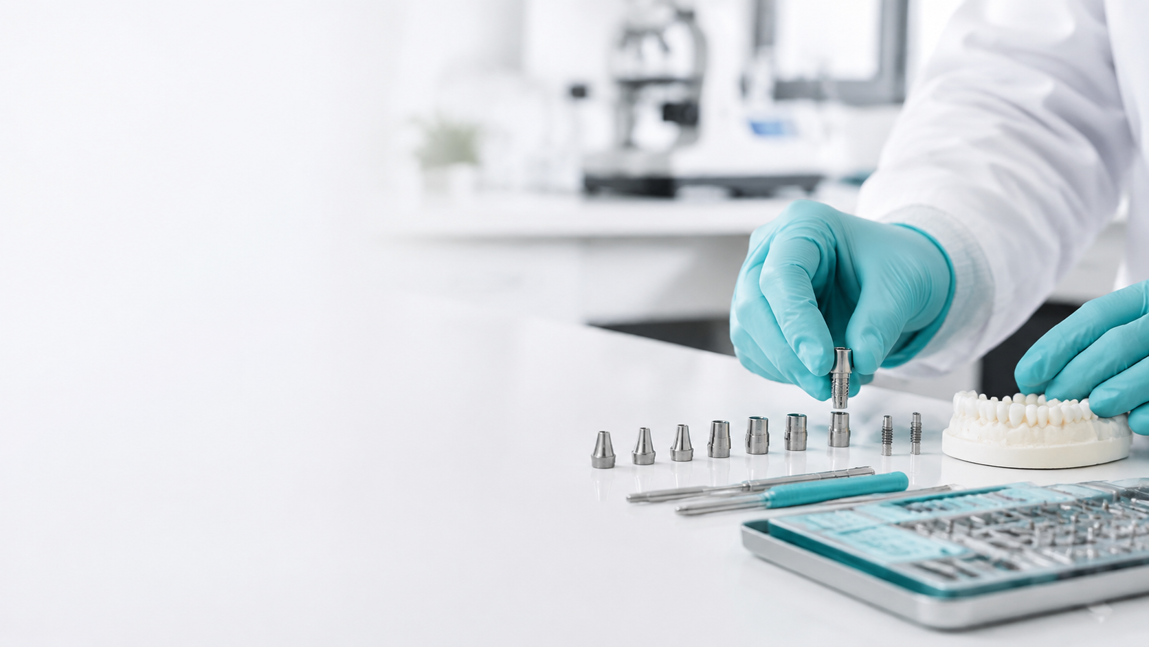 Dental professional organizing titanium restorative components into a connected workflow